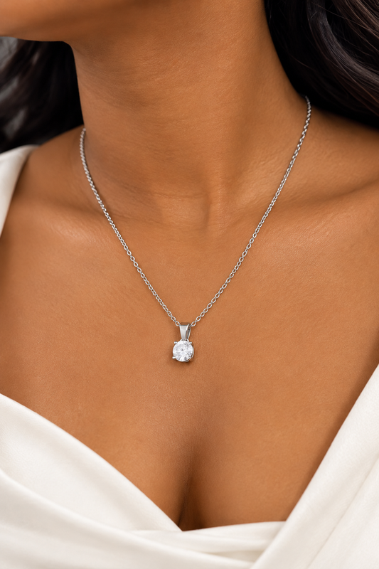 Silver-tone necklace worn by a model