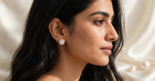 Elara studs in gold, elegant side-profile on model