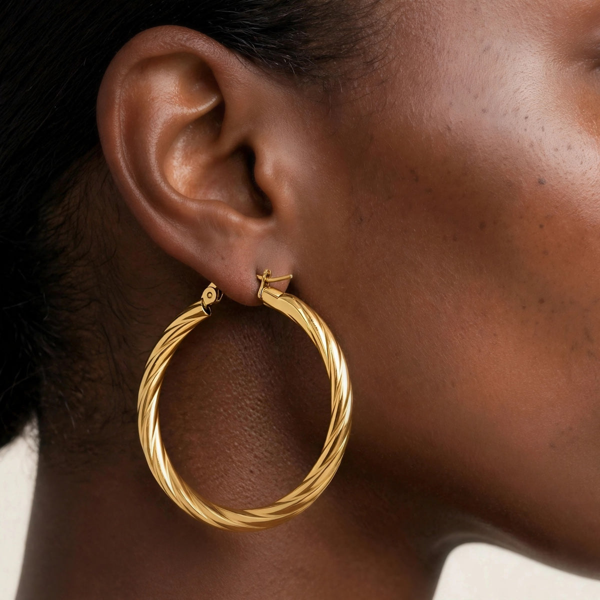 Rosali gold hoop twisted texture, macro detail on ear